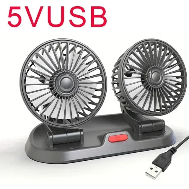 A gray car cooling fan with two rotating blades and an aromatherapy diffuser is shown on a charging base.