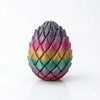 A 3D printed dragon twist egg stress reliever with a multicolored, iridescent shell.