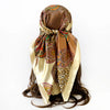 A square scarf featuring a leopard print and paisley pattern in shades of brown, gold, and orange.