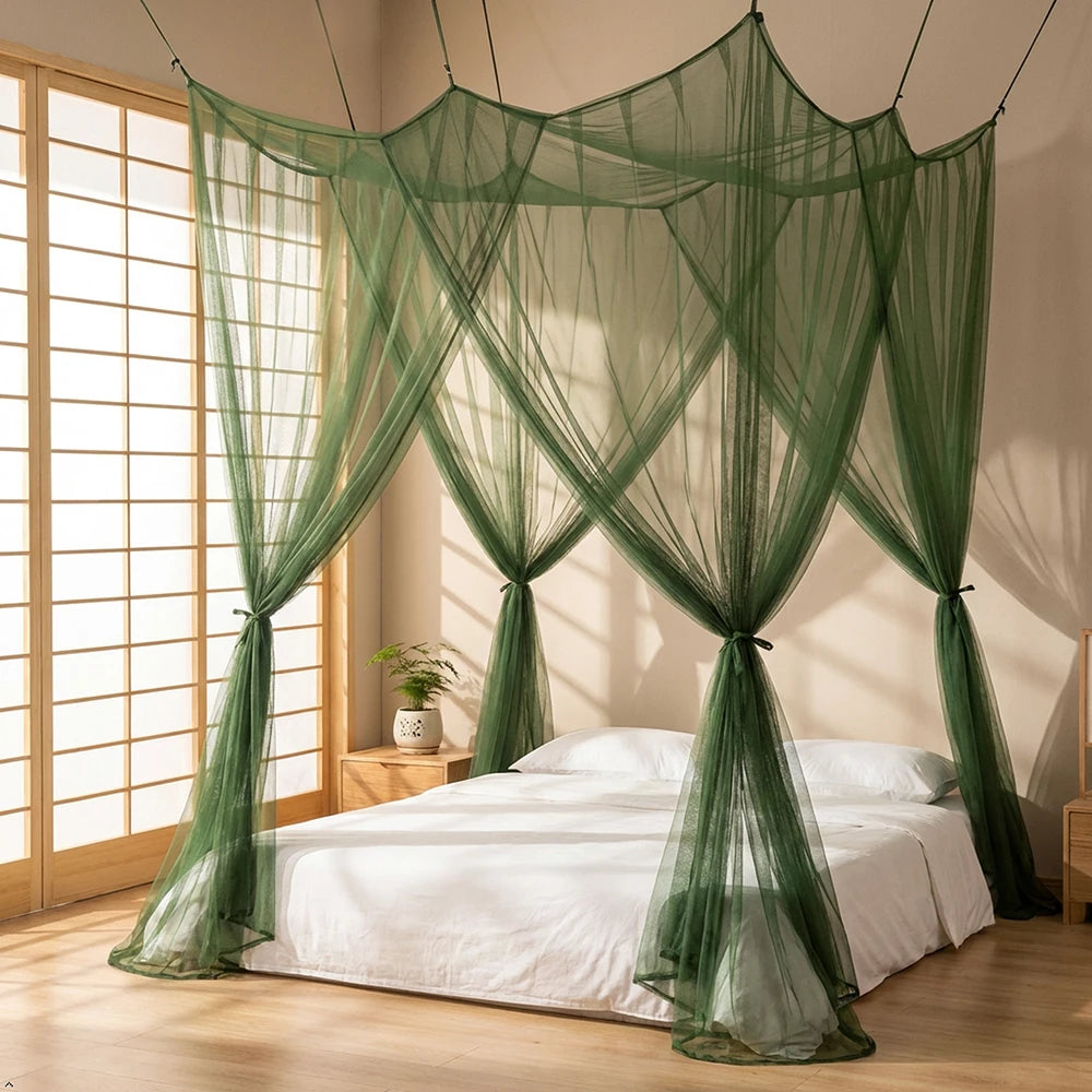 Elegant mosquito net bed canopy draped over a white bed in a bright room.