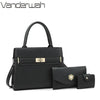 Black leather handbag with gold hardware and a matching coin purse.