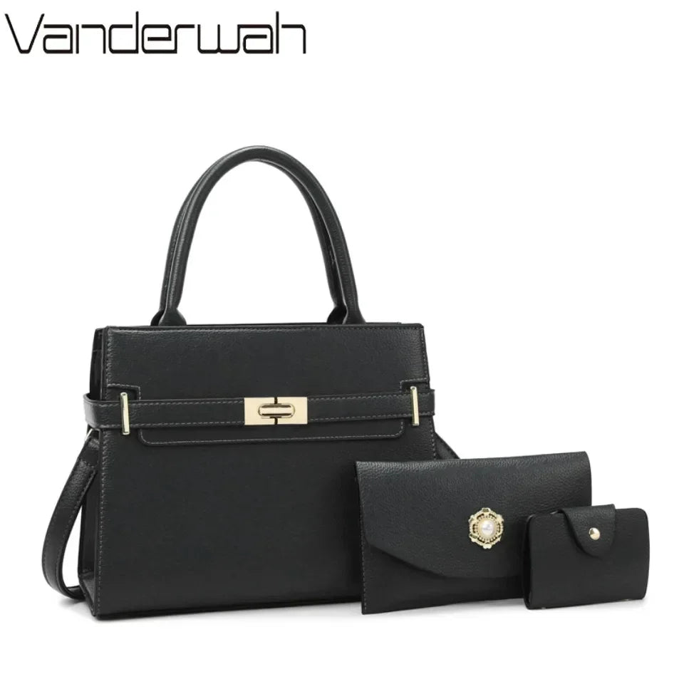 Black leather handbag with gold hardware and a matching coin purse.