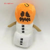 An orange and brown plush doll resembling a Minecraft character, possibly Steve or a similar figure.