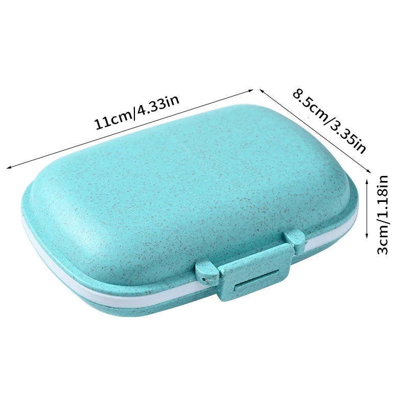 Light blue weekly pill organizer with an open lid and compartment measurements displayed.