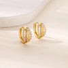 Boucles d'oreilles créoles en zircon cubique ton or