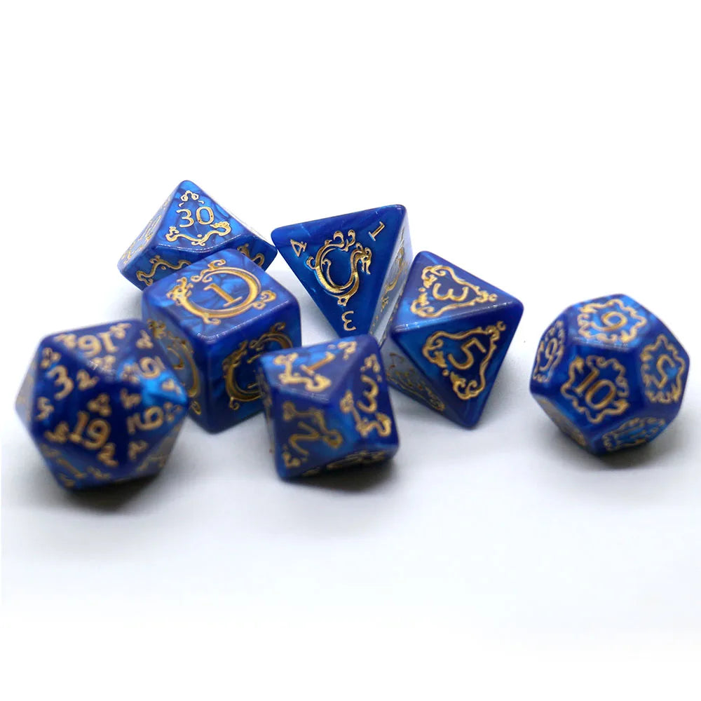 A set of blue dragon-embellished polyhedral dice for tabletop role-playing games