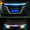 Front view of a car with an RGB LED light strip running across the hood and headlights.