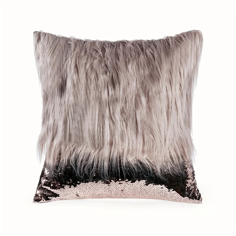 A decorative pillowcase featuring silver and gold sequins on a fur cushion cover.