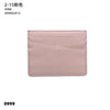 A pale pink genuine leather slim card holder wallet with a stitched texture and diagonal lines.