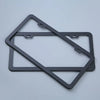 A black rustproof stainless steel license plate frame with a rectangular cutout and mounting tabs.