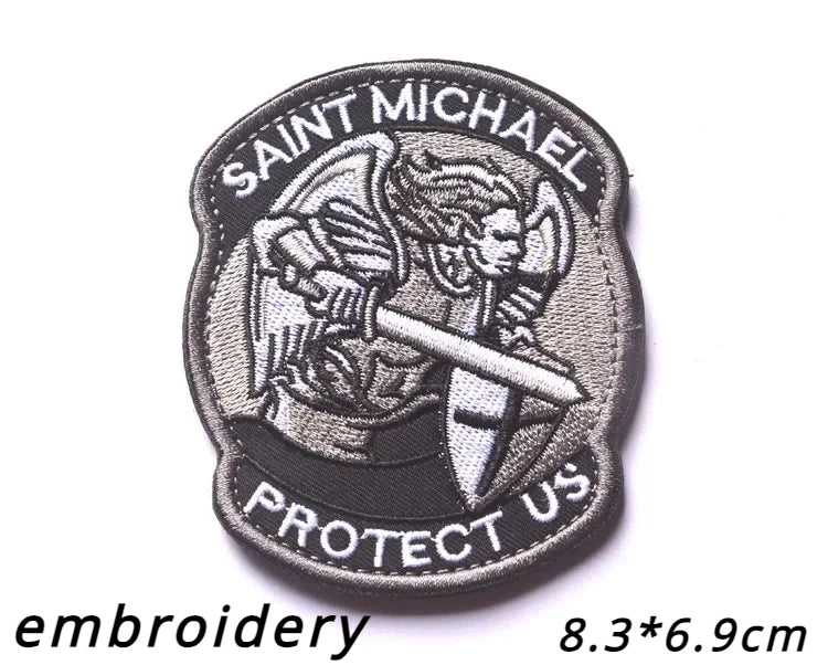 Black embroidered patch featuring the name Saint Michael and the text Protect Us