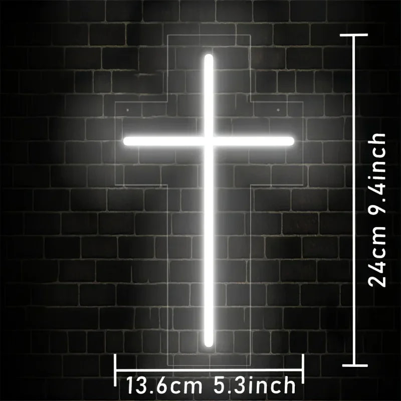A bright white LED Jesus cross neon sign mounted on a dark brick wall.