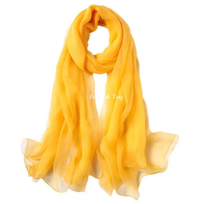 A bright yellow silk scarf draped elegantly.