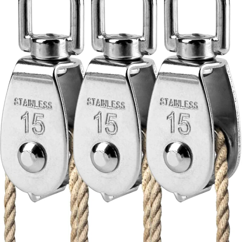 Three stainless steel swivel pulleys with hooks hanging from thick rope