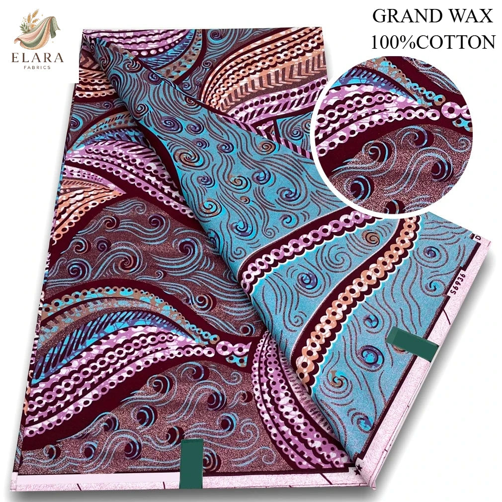 A close-up view of pink glitter African wax print fabric in various patterns and colors