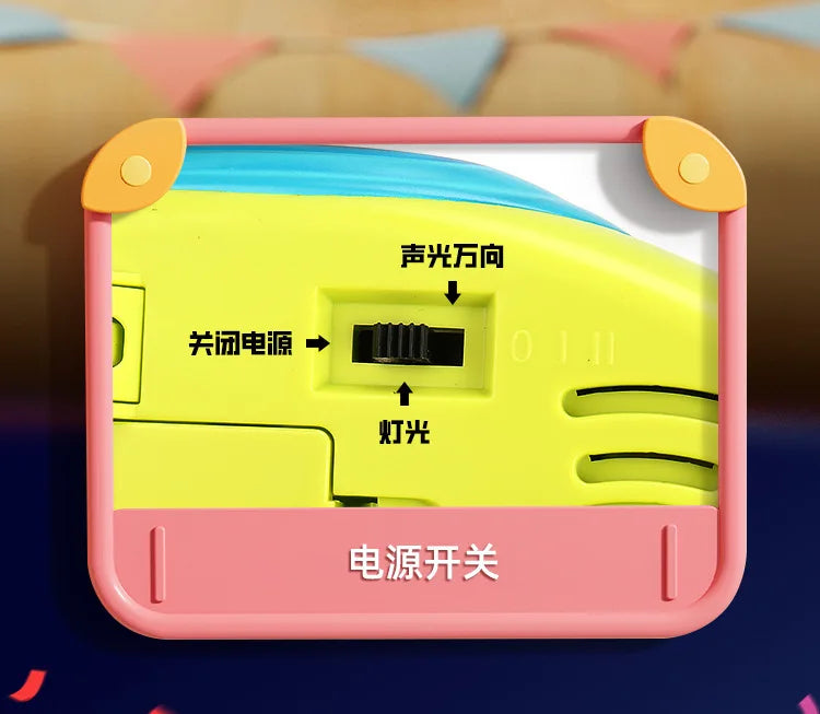 A yellow electronic toy box showing features like sound output, battery connection, and light switch.