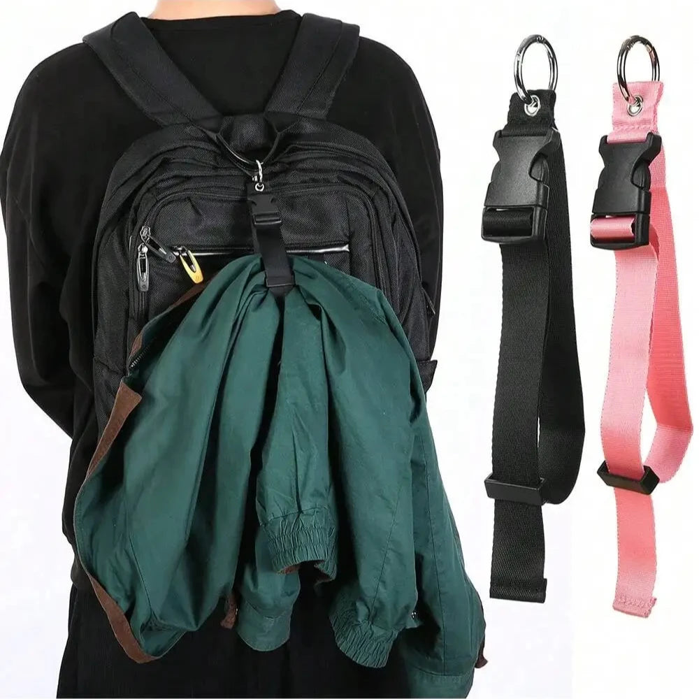 A dark green durable polyester luggage strap with an attached ID tag shown against a black shirt.