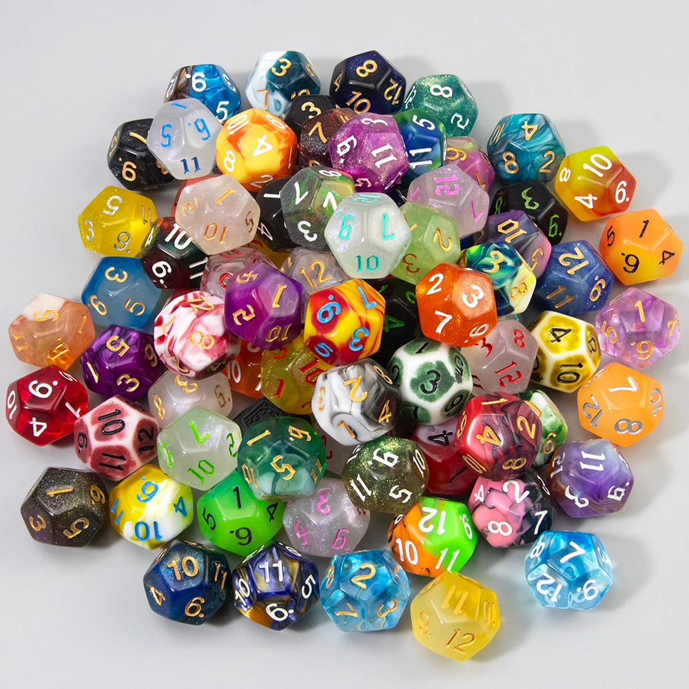 A collection of ten polyhedral dice in various colors and shapes scattered on a white surface.
