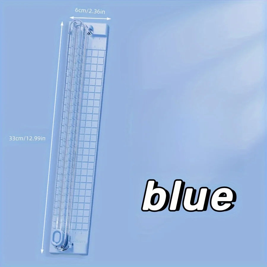 A blue portable paper cutter trimmer with a 33cm length and 6cm blade visible.