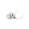 A silver metal button and a circular blank button are shown for a jeans button repair kit.