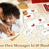A hand writes a message on a blank note card and envelope set for sending love notes.