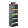 A gray hanging closet organizer with five labeled pockets for Monday through Friday.