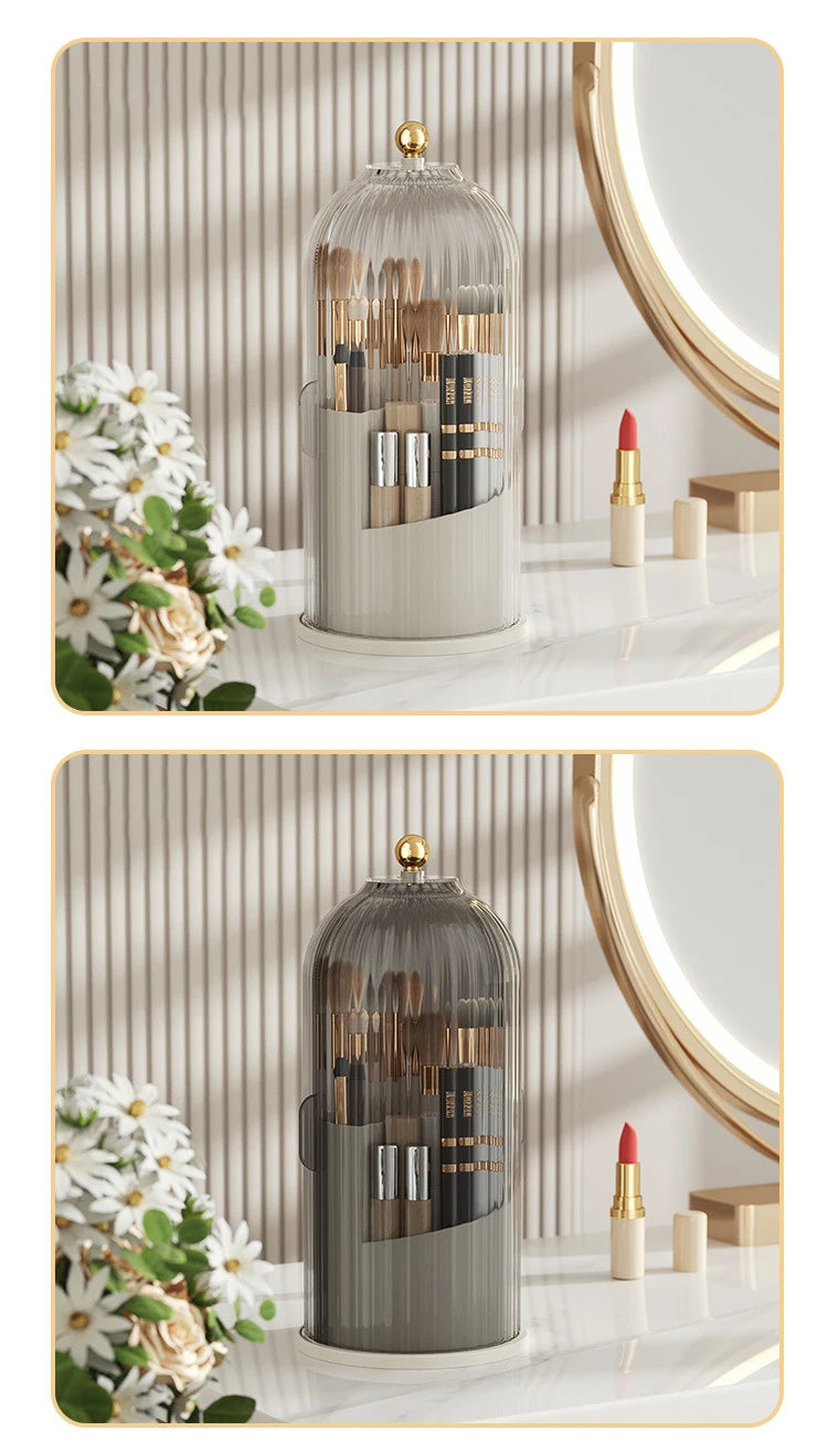 A clear glass rotating makeup brush holder with a dustproof lid displayed on a marble surface.