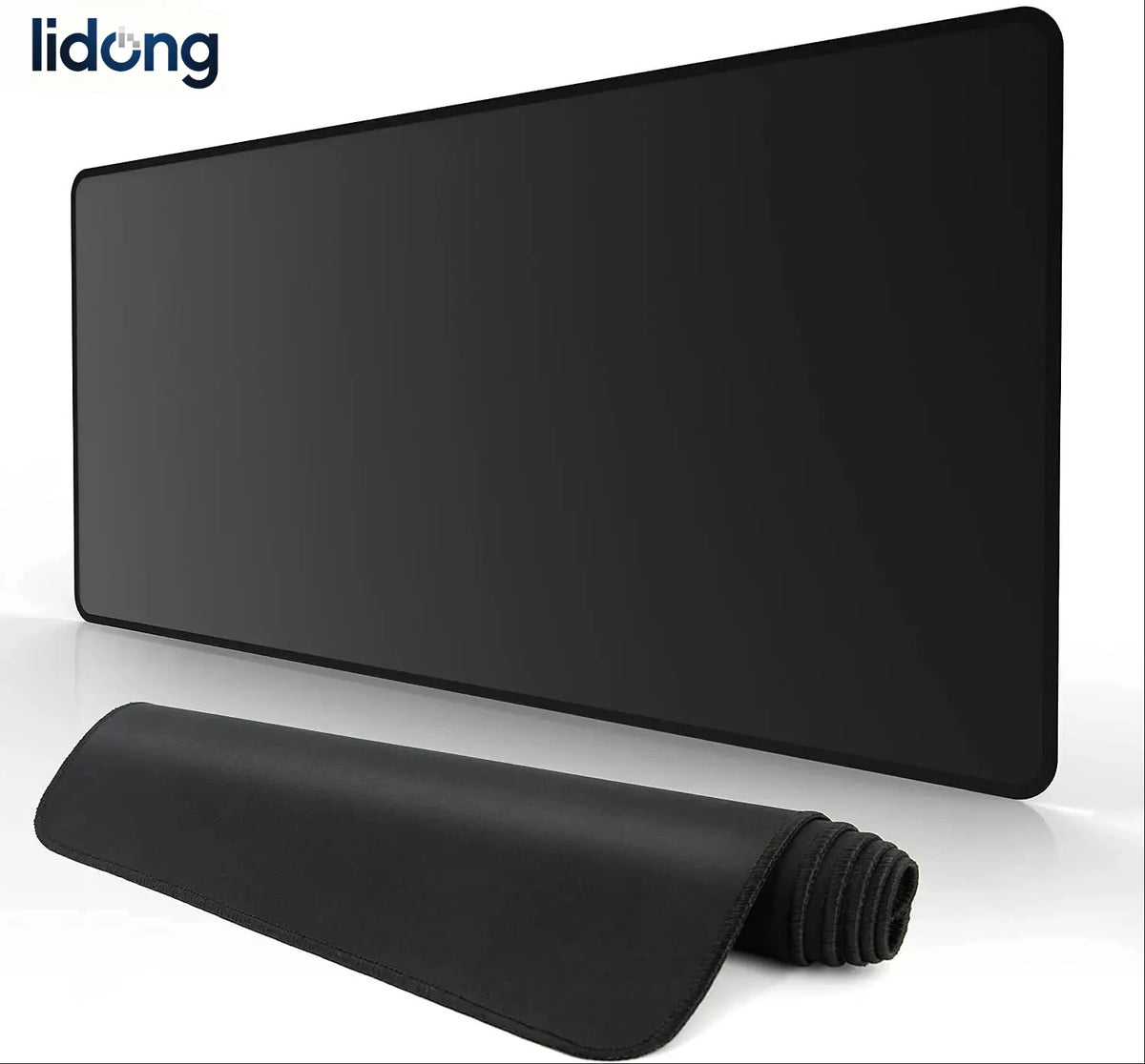 A black extended anti-slip desk pad with stitched edges is shown on a white surface.