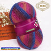 A ball of gradient dyed wool blend yarn in shades of pink, purple, and blue, tied with a purple ribbon.