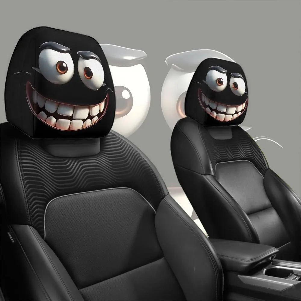 A set of two black smiley face car headrest cushion covers shown in a vehicle seat.