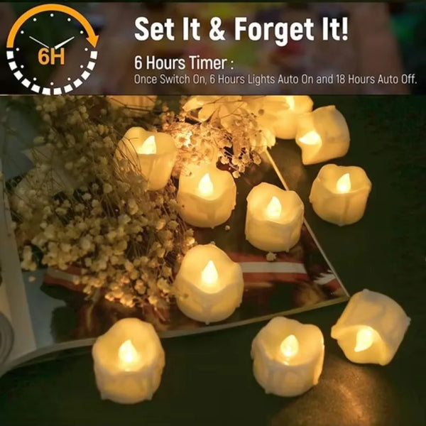 A close-up of several glowing white LED tea lights arranged on a surface.