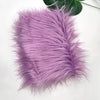 A fluffy purple faux fur fabric used for DIY sewing, doll hair, and cosplay.