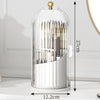 A clear glass cylindrical holder for makeup brushes with a rotating lid and dustproof design.