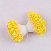 A bundle of 400 pearl flower stamens in bright yellow and white for DIY crafts and wedding decor