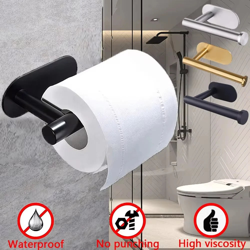 A set of five stainless steel bathroom accessories, including a toilet paper holder and soap dispenser, mounted on a wall.