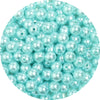 A close-up view of small, round, light blue imitation pearl beads for jewelry making.
