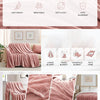 Various shades of pink and rose colored flannel throw blankets shown in different sizes and textures.