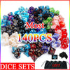 A pile of 140 polyhedral dice in various colors and shapes with a storage bag visible.