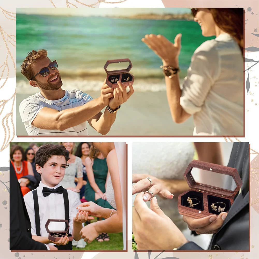 A woman holds an engraved walnut wood ring box with a black velvet pouch, while a man smiles nearby.
