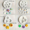 A collection of silicone molds shaped like lotus flowers and daisies for resin and craft projects.