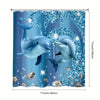 A blue and silver glitter curtain featuring a dolphin design for a bathroom or shower.