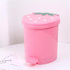 Pink mini strawberry trash can with a green pop-up lid