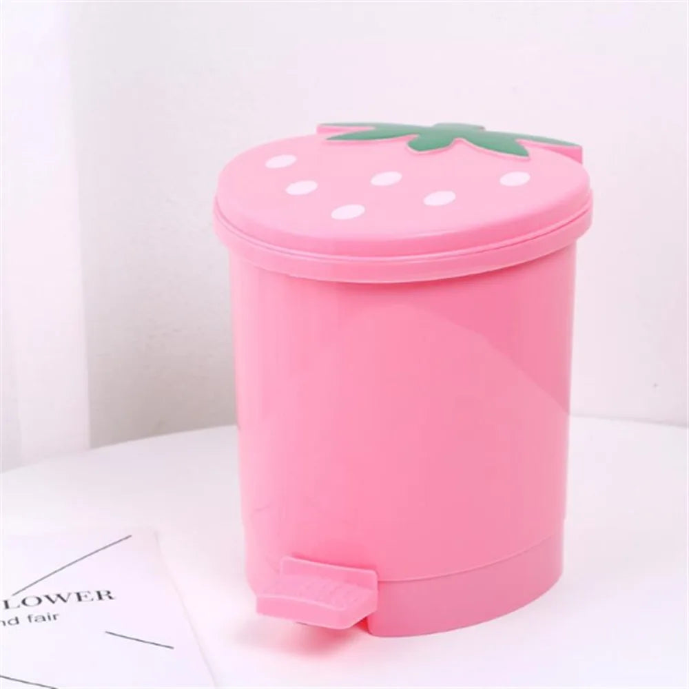 Pink mini strawberry trash can with a green pop-up lid