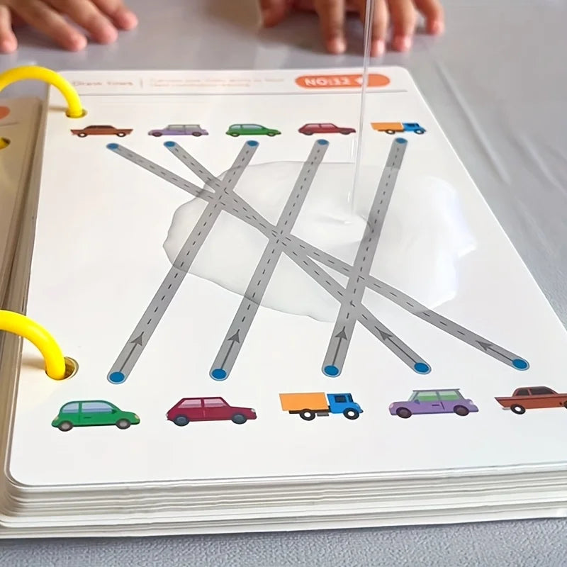 A page from a reusable magic tracing workbook showing various colored cars and vehicles drawn with lines.