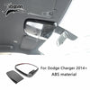 Carbon fiber interior trim kit for Dodge Charger featuring an aftermarket headlight assembly.
