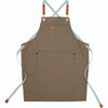 A brown cotton canvas apron with adjustable straps and multiple pockets for kitchen or salon use.