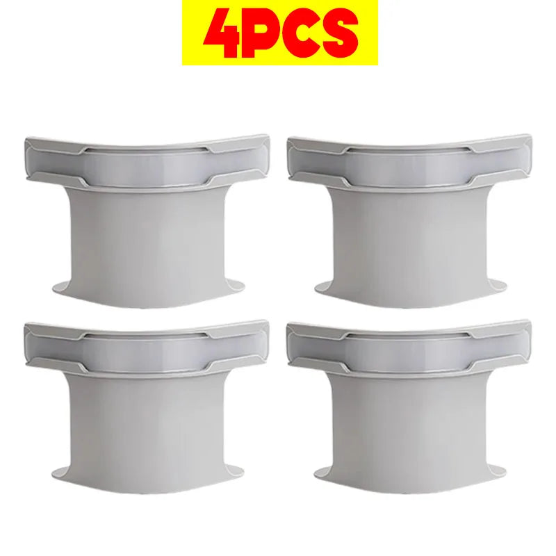 Four white non-slip bed sheet fixing clips or straps for securing bedding.