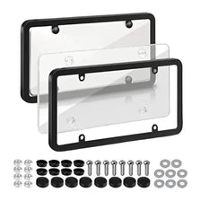 A set of tinted license plate protectors and mounting hardware for vehicle plates.