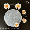 A silicone mold with various daisy shapes is shown alongside finished flowers and dimension markers.