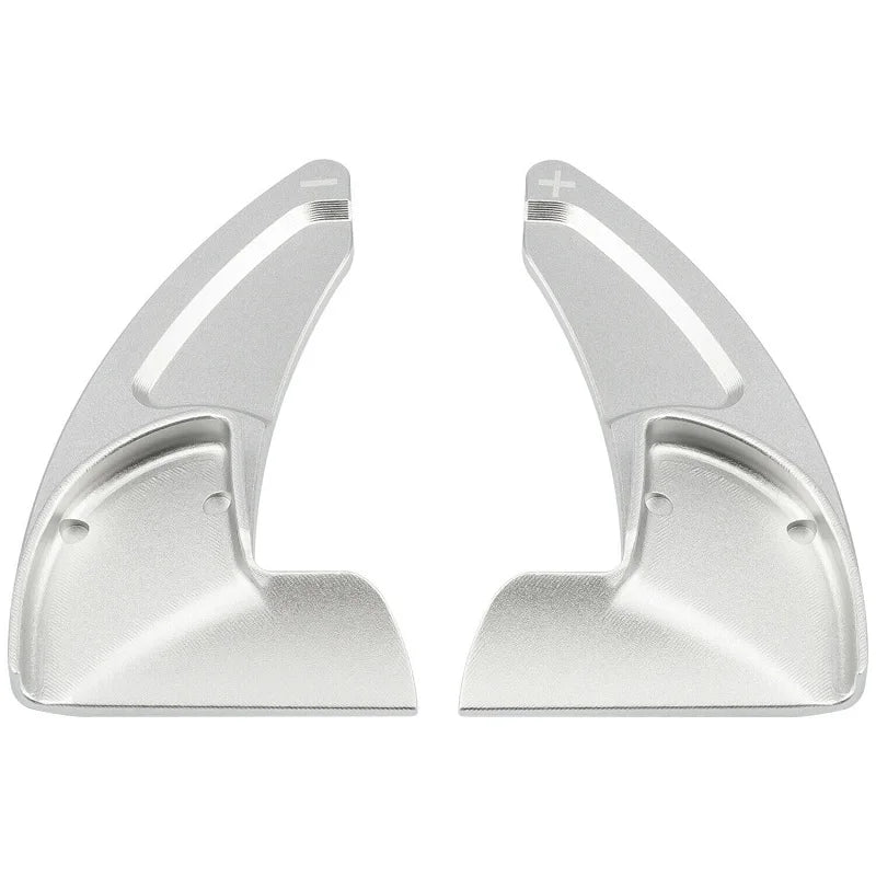 A pair of silver aluminum shift paddle extenders shown side by side.